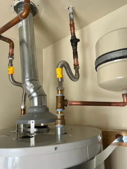 Water heater installation and plumbing repair in North Andrews Garden